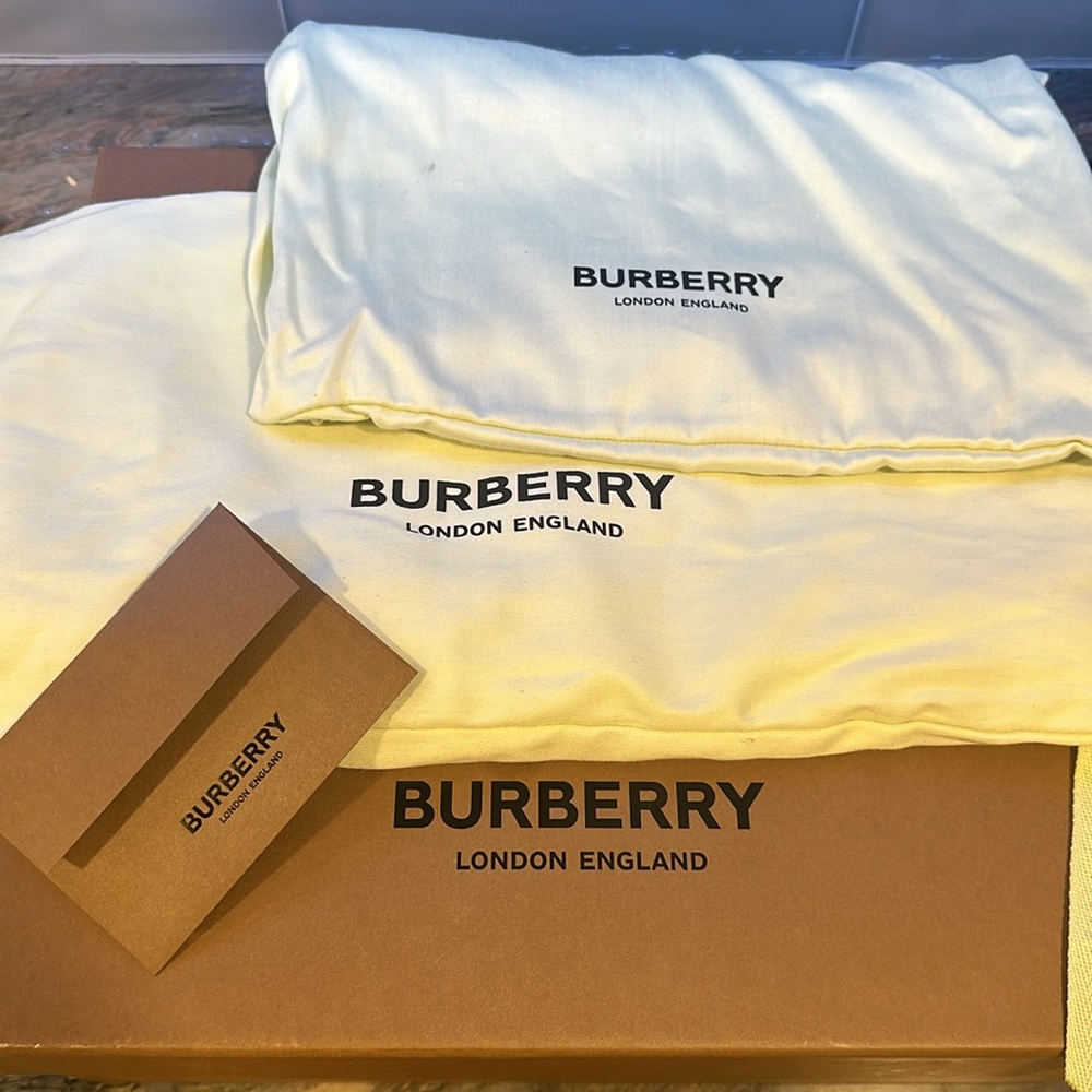 Burberry hat NEVER USED. Brand new comes with two dust bags and box. - Picture 3 of 4